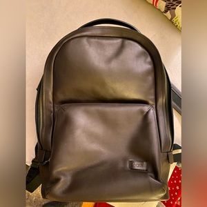 Dark chocolate leather Tumi backpack in excellent condition